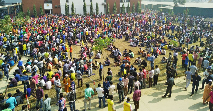 Figure 3: Workers in front of the factory building during a fire drill.