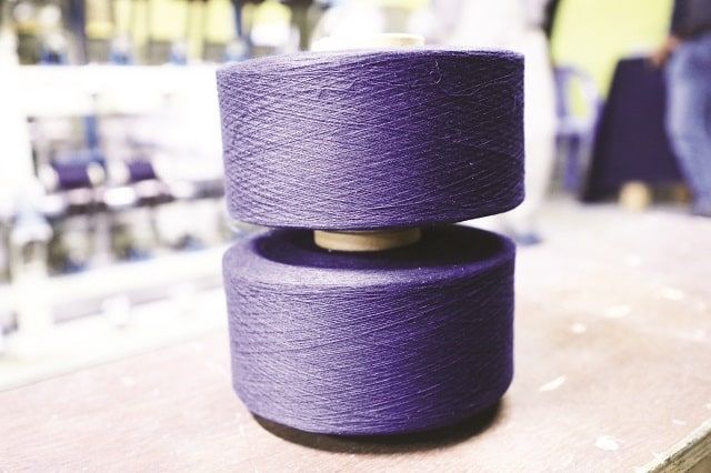 https://textiletoday.com.bd/storage/uploads/2021/02/Indigo-dyed-yarn-cone-Nice-Denim-Mills.jpg